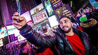 student taking selfie in Leicester Square