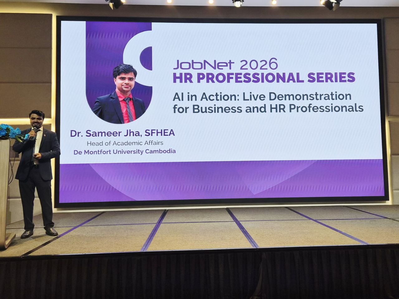 Dr. Sameer Jha, Head of Academic Affairs at De Montfort University Cambodia, presenting a live AI demonstration at JobNet 2026 HR Professional Series